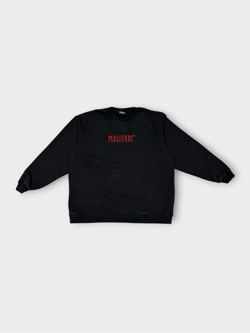 PLEASURES “Now” Crewneck Sweatshirt